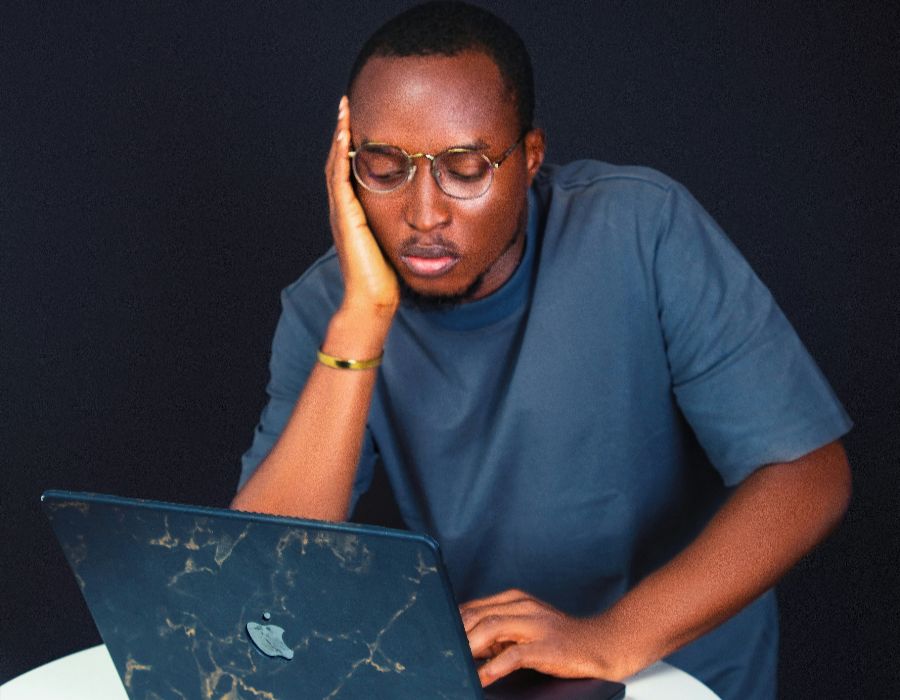 person stressed reviewing bank account after IRS bank levy