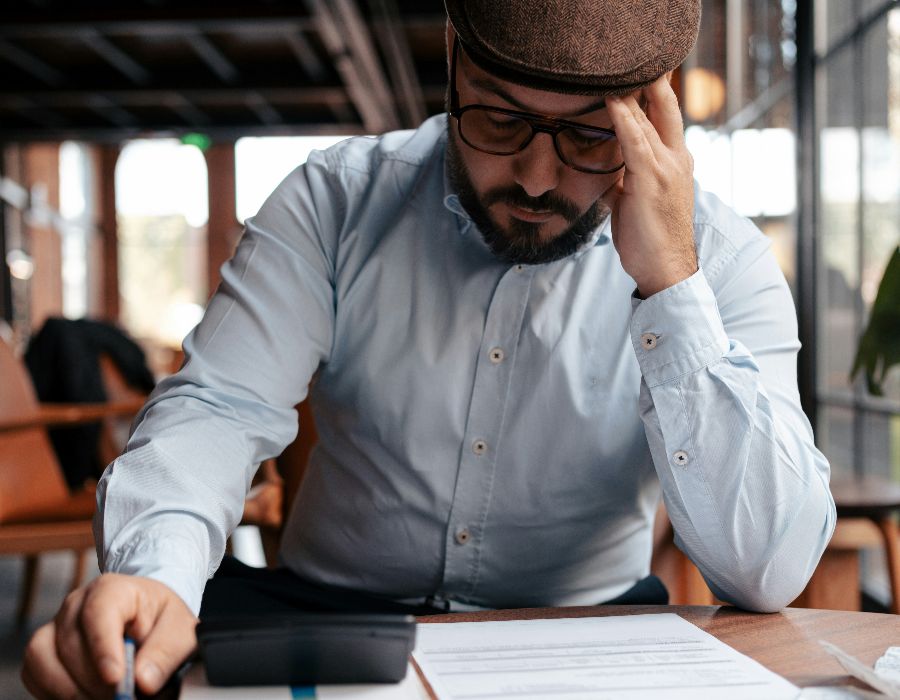 Taxpayer reviewing IRS collection notices before a bank levy