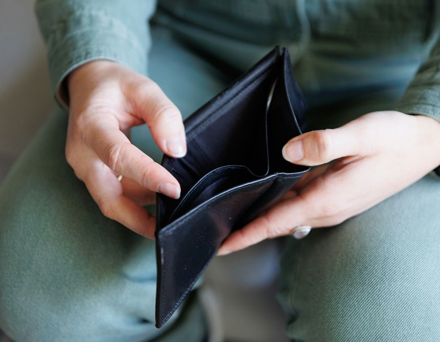 Taxpayer reviewing empty bank account after IRS bank levy