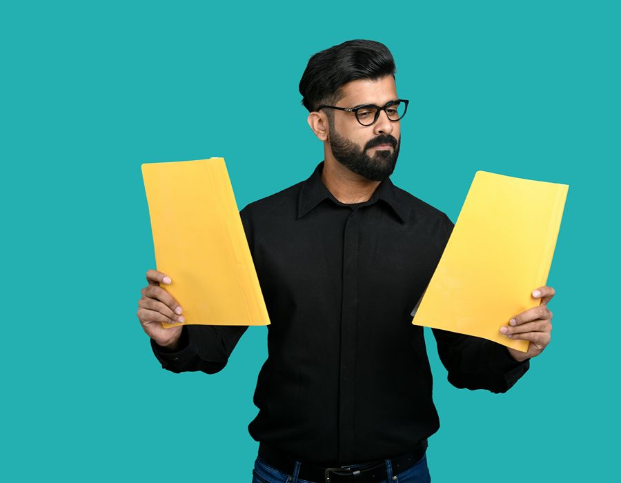 Man looking at IRS Levy and IRS Wage Garnishment